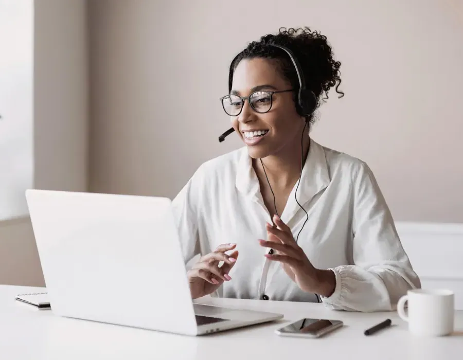 Billing and Coding Student Learning Online at Home on Laptop